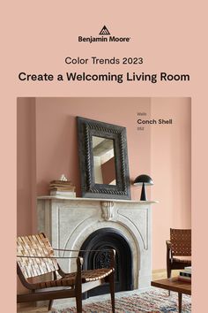 a living room with pink walls and a fireplace in the center is an ornate mirror