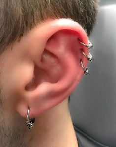 a man with ear piercings on his ears