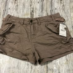 Questions? Leave A Comment Below! Brown Cargos, Brown Cargo Shorts, Thrift Wishlist, Cargo Shorts Women, Micro Shorts, Red Trench Coat, Birthday Trip, Cozy Jacket, Free People Shorts