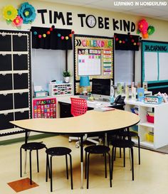 an empty classroom with desks and chairs in front of the chalkboard that says time to be kind