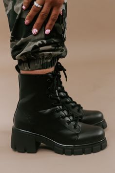 Step into urban chic with our High Street Combat Boot in Black. These boots seamlessly blend style and functionality, adding an edgy flair to your look while providing the comfort and durability needed for any adventure. Combat boot Lace up Platform boot Black Zipper up the side Need help with sizing? No problem! Join our VIP group on Facebook, Everyday Chic Boutique VIP Insiders to chat directly with our team and other customers just like you.Packaged with love and shipped from our warehouse in Wilmington, Ohio Combat Boots Outfit For Women, Boots Outfit For Women, Combat Boot Outfits, Combat Boot Outfit, Girls Combat Boots, Black Platform Boots, Vip Group, Everyday Chic, Combat Boot