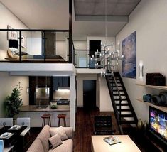 a living room filled with furniture and a stair case in front of a flat screen tv