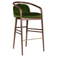 an upholstered wooden chair with green velvet seat and armrests, viewed from the front