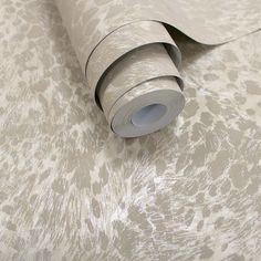 a roll of wall paper on the ground