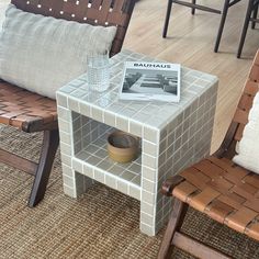 a small table with a magazine on it