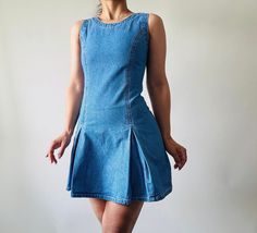 vintage blue denim mini dress,MOD style denim skater dress *size: xxs-xs *measurements (centimeters) bust 76 waist 62 hips 82, length 80 *condition: great vintage condition *fabric: cotton *washing instructions: gently hand wash in cool water or dry clean it Please make sure you check all the measurements of the item before purchasing. Vintage garment sizes are not the same as those of today. To ensure your best fit it's best you measure yourself or a similar item. The size listed it's an approx Fitted Mini Length Denim Dress, Vintage Summer Denim Mini Dress, Summer Vintage Denim Mini Dress, Retro Fitted Denim Summer Dress, Blue Denim A-line Mini Dress, Fitted Blue Vintage Denim Dress, Fitted Vintage Blue Denim Dress, Blue A-line Denim Mini Dress, Vintage Mini Length Denim Dress