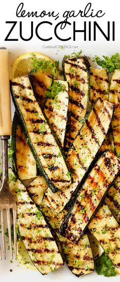 grilled zucchini with lemon garnish and parsley on the side