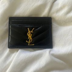 Black With Gold Hardware In Good Condition. Comes With Box And Dust Bag Ysl Wallets, Ysl Star Card Holder, Ysl Pink Card Holder, Ysl Card Holder, Saint Laurent Card Holder, Ysl Envelope Chain Wallet Black, Gold Hardware, Vintage Accessories, Yves Saint Laurent