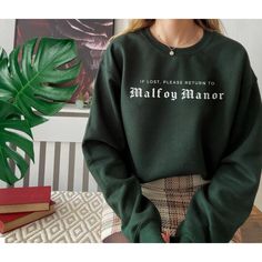 Malfoy Manor Book Sweatshirt Potter Shirt Malfoy Sweatshirt Wizard School Dracotok Dark Academia Clothing Bookish Shirt Book Lover Gift for Readers Green House Sweater Reading Shirt   Shop all The June Kind - https://www.etsy.com/ca/shop/TheJuneKind? ---------- Please read before placing your order -------------- 1. This apparel is GENDER NEUTRAL / UNISEX. The relaxed fit is flattering for all bodies. 2. Refer SIZE CHART for measurements. Size up for oversized looks. 3. PRODUCT is a Unisex Crewn Minimalist Teacher, Malfoy Manor, Teacher Graduation Gifts, Preschool Teacher Shirts, Wifey Sweatshirt, Gifts For Teacher, Mrs Sweatshirt, Dark Academia Clothing, Kindergarten Gifts