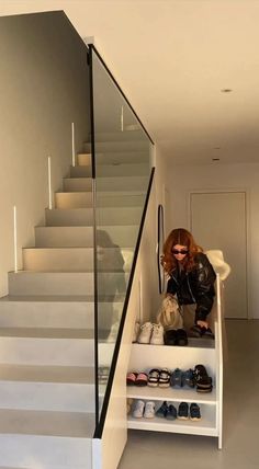 That is so cool. Neat, hidden, space-saving and above all the shoe storage is bomb. Shoe Rack Under Stairs, Staircase In Living Room, Storage Under Stairs, Under Stairs Space, Under Stairs Storage Ideas, Stairs Storage Ideas, Stairs Modern, تحت الدرج, Under Stairs Storage