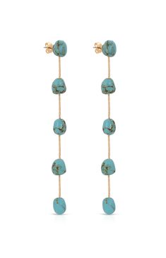 Online Only! Add a touch of vibrant elegance with Ettika's Dripping Turquoise 18k Gold Plated Earrings, featuring turquoise beaded accents delicately strung on a gold chain with a secure post-back closure. These earrings blend luxury with bohemian charm, perfect for elevating your summer wardrobe.


	18k gold plated Brass Semi-precious Turquoise
	Length: 4.25"
	Post back closure Turquoise Drop Earrings, Gold Plated Earrings, Underworld, Turquoise Beads, Summer Wardrobe, Pacsun, Gold Chain, Gold Chains, Semi Precious