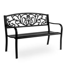 a black metal bench sitting on top of a white floor