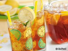 two glasses filled with iced tea and lemon slices