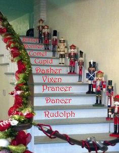 christmas decorations and nutcrackers are on the stairs