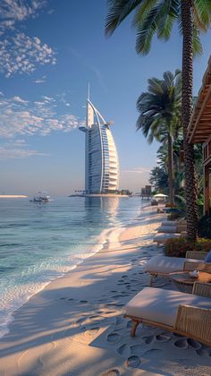 the beach is lined with chaise lounges, palm trees and burj