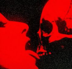 a red image of a skull and a woman's face with her mouth open