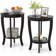 two black tables with one end table and the other side is holding a bowl of fruit