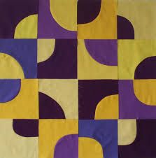 a piece of cloth that has been made to look like an abstract pattern with circles and rectangles on it