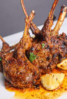 a close up of a plate of food with meat