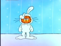 a cartoon rabbit is standing in the snow with an orange on it's face