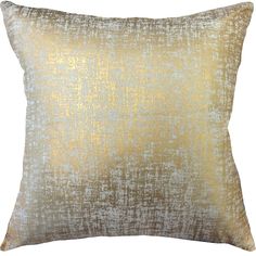 a gold and white pillow on a white background with an ombretta pattern in the middle