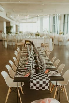 a long table set up with checkered runneres