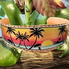 Add a touch of bohemian charm to any outfit with our Handmade Boho Copper Tropical Palm Cuff Bracelet. Each piece is expertly crafted with copper and features intricate tropical palm designs, perfect for adding a touch of Florida style to your look. Elevate your wardrobe with this unique and stylish accessory. One Size Fits All Adjustable Ships in Gift Box FAST shipping . Palm Cuff, Bracelet Gift Box, Boho Tropical, Florida Style, Wide Cuff Bracelets, Tropical Landscaping, Tropical Palm, Wide Cuff, Handmade Boho