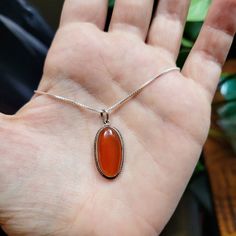 Vintage Sterling Silver Timeless Carnelian Necklace. Unhallmarked. Approx 3cm Long With Bail. I Have Added A Brand New 925 Sterling Silver 18" Box Chain As The Original Was Lost Years Ago . Beautiful. . . _____ Jewelry Classic Dainty Elegant Gift Gifts Present Presents Stocking Stuffers Chains Pendants Shoe Open Opens Opening Nursery Rhyme Red Oval Orange Stone Stones Gem Gems Gemtone Classic 925 Gemstones Charms Charm Pend Q50 + Vox Chains Pendants, Jewelry Classic, Carnelian Necklace, Orange Stone, Nursery Rhyme, Box Chain, Elegant Gift, Chain Pendants, Vintage Sterling Silver