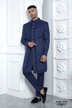 Hello Community, Royal Blue Grooms Sherwani, Jodhpuri Suit sherwani Indowestern outfit , indian wedding grooms men Dress, classical prince coat sherwani for Wedding, Ceremonial Event, Family Gathering Elevate your style with our Royal Blue Grooms Sherwani, a luxurious 3-piece Line Art Silk ensemble in a double-layer design. This Indo-Western Jodhpuri suit is perfect for weddings, ceremonial events, and family gatherings, blending classical prince coat elegance with modern sophistication. Explore Ceremonial Blue Bandhgala With Chikankari Embroidery, Traditional Blue Bandhgala With Naqshi, Blue Bandhgala With Naqshi For Formal Occasions, Formal Blue Sherwani With Naqshi Detailing, Formal Blue Sherwani With Naqshi, Bollywood Bandhgala With Chikankari Embroidery For Groom, Blue Bandhgala With Naqshi Traditional Drape, Blue Traditional Wear With Dabka For Groom, Blue Sherwani With Naqshi For Festive Occasions