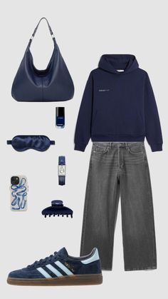 a man's outfit and accessories are arranged in the shape of a hoodie