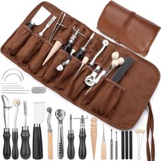 an assortment of kitchen utensils in a brown case