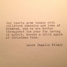 an old typewriter with the words our hearts grow tender with childhood memories and love of kindred, and we are better throughout