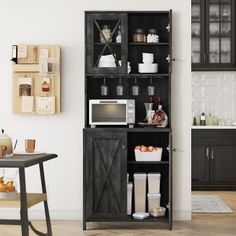 This tall bar cabinet is a versatile storage solution for your home. It features a wine rack, open shelves, and a cabinet with hidden shelves to store and display your kitchen, dining, or bar essentials. Tall Bar Cabinet, Free Standing Kitchen Cabinets, Tall Bar, Microwave Stand, Pantry Storage Cabinet, Sideboard Storage Cabinet, Kitchen Pantry Storage, Freestanding Kitchen, Buffet Sideboard