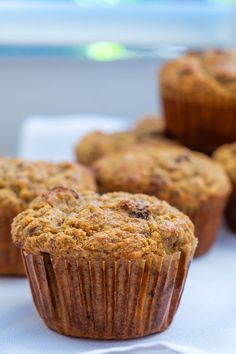 several muffins sitting on top of a white table