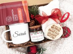 a christmas gift box with coffee, cookies and other items