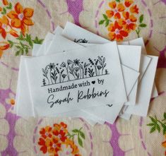 handmade with by savannah robinies embroidered labels on floral fabric, set of four