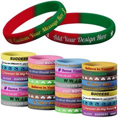 wristbands with different colors and words on them are shown in front of a white background