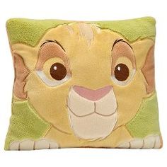 a pillow with a lion face on it