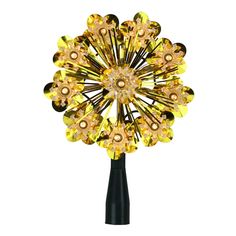 a yellow and black flower shaped object with lots of beads on it's center