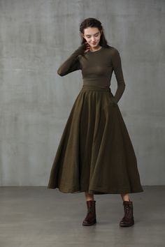 "Introducing our flattering wool skirts. Winter days do not mean that you need to resign to elegance. Boasting a soft wool-blend construction, this spiral skirt from Linennaive proves that you can be elegant and warm at the same time. Featuring a high waist, a elastic waist with rear zip fastening, a flared style, side pockets and a midi-length. 【Material】 -Wool 87%, Elastane 13% 【Length】 32-33 inches. 【Size】 *SIZE XS length: 32\"/82 cm waist: 26\"/ 66 cm *SIZE S length: 32\"/82 cm waist: 27\"/ Flowy Full Maxi Skirt For Fall, Flared Maxi Skirt For Fall, Fall A-line Gathered Maxi Skirt, Voluminous Lined Maxi Skirt For Fall, Lined Long Maxi Skirt For Fall, Fall Full Lined Maxi Skirt, Fall Pleated Full Skirt, Fall Midi Voluminous Skirt, Fall Voluminous Skirt