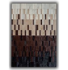 a piece of art that is made out of wood and leather with different colored squares on it