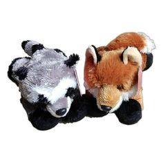 two stuffed animals that are next to each other