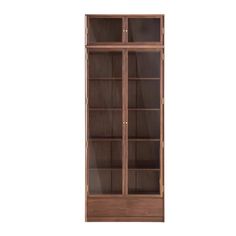 a wooden bookcase with glass doors on the front and bottom shelves, against a white background