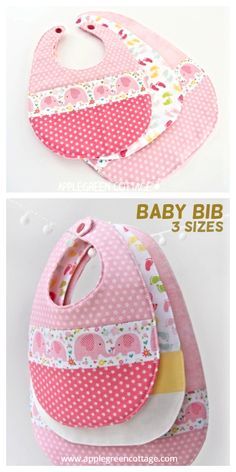 two bibs with pink polka dots on them and one has an apple design in the middle