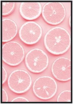 pink grapefruit slices arranged in a pattern on a light pink background with black border