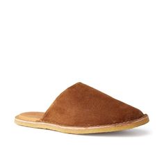 Men's slip-on mules made in Portugal from premium suede Brown Mules With Suede Lining And Slip-on Fit, Suede Slip-ons With Suede Lining And Closed Toe, Suede Slip-ons With Suede Lining, Classic Brown Slippers With Suede Lining, Classic Slip-on Mules With Suede Lining, Brown Suede Slip-on Slippers, Suede Closed Toe Mules With Branded Insole, Brown Suede Slip-ons With Leather Footbed, Brown Leather Mules With Suede Lining