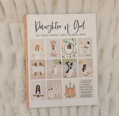 the daughter of god coloring book is laying on a white furnishing blanket with an orange and yellow border around it