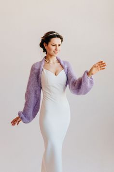 Mohair Bolero Shrug. Bridal Jacket. Bolero jacket is a beautiful addition to a festive or wedding dress that will match the style of the outfit and also keep you warm and protect from the cold wind. Shrug bolero is made in the form of a cropped jacket that covers the arms, shoulders and part of the back. The neckline remains open, and the bolero does not cover the beautiful wedding dress. Beautiful puffy sleeve drapes easily and is fixed on the wrist of the arm. Bolero made of blend mohair wool Shrug With Dress Outfit, Bolero Jacket Crochet, Formal Shrugs For Dresses, Elegant Fall Wedding Cardigan, Elegant Winter Wedding Cardigan, White Long Sleeve Cardigan For Wedding, White Long Sleeve Wedding Cardigan, Elegant Fitted Cardigan For Weddings, Fall Wedding Long Sleeve Shrug