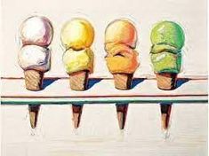 four ice cream cones sitting on top of a wire