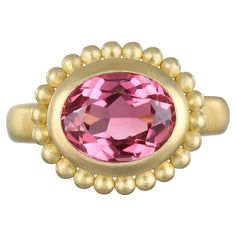 Handcrafted by Faye Kim in 18 karat gold, this Emerald cut pink tourmaline, with its vibrant hue, is bezel set with a halo of granulation beads for a timeless, classic style ring. Tourmaline: 2.75 carats Bezel Dimensions 14.9 x 12.9mm Size 4.5, Can be resized RN275 Bezel Ring, Emerald Cut, Gorgeous Jewelry, Bezel Setting, Pink Tourmaline, Cocktail Rings, Tourmaline, Fashion Rings, Halo